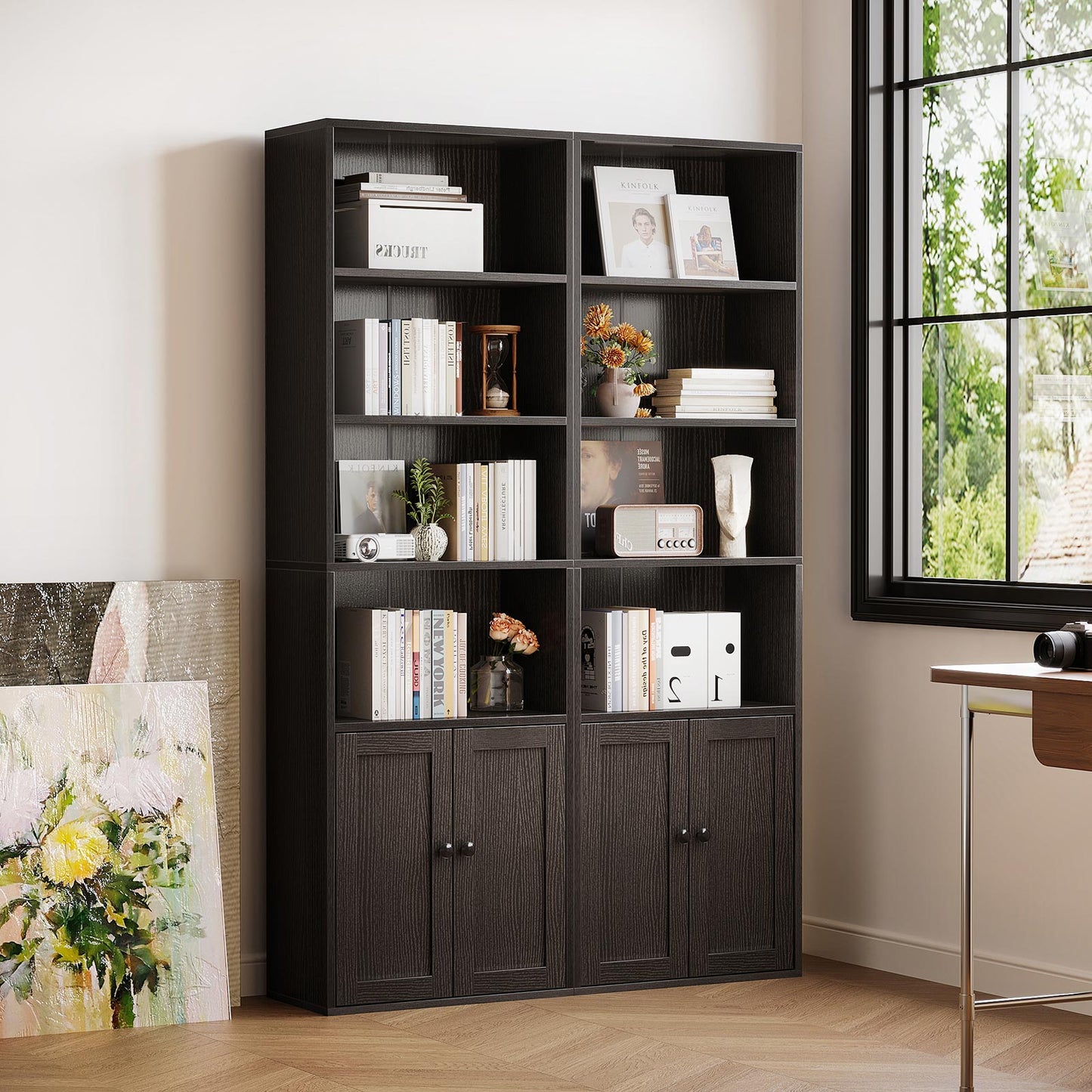 Coleshome tall bookcase with doors, black wood finish, open shelves and lower cabinet in a bright home office