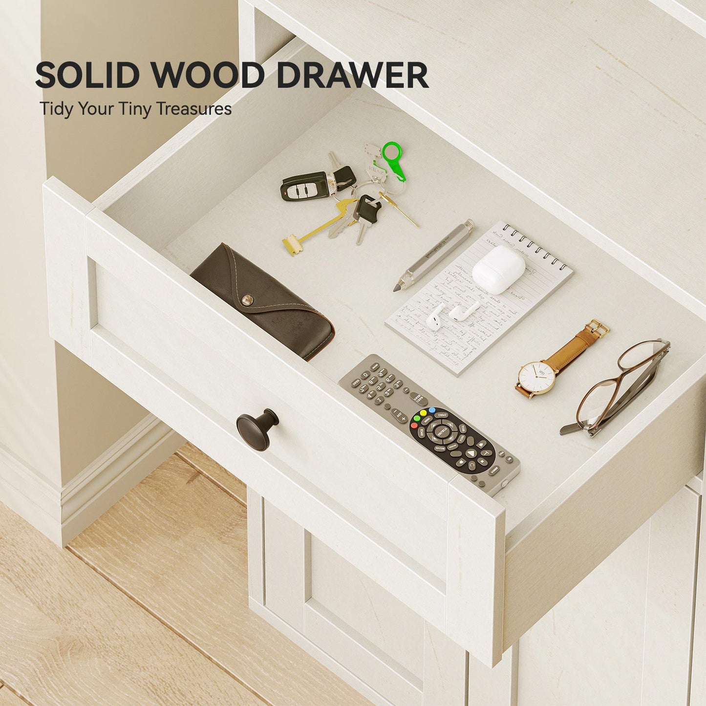 Close-up of the drawer in a Coleshome bookcase cabinet, showing storage for small everyday items