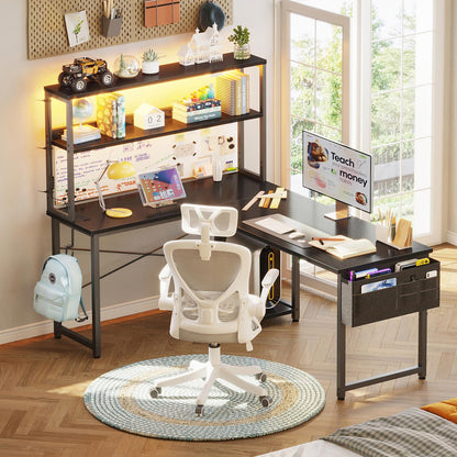 Black 135cm x 100cm L-shaped desk with upper storage hutch, LED lighting, and side hanging fabric drawer organizer, used as a student study and computer desk.