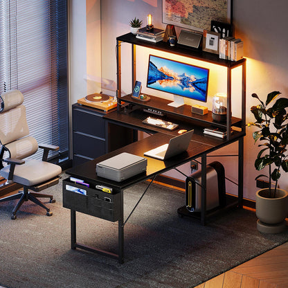 Black L-shaped desk with LED-lit hutch shelves and side fabric drawer cabinet in a modern home office, featuring a monitor riser shelf and spacious workstation layout.