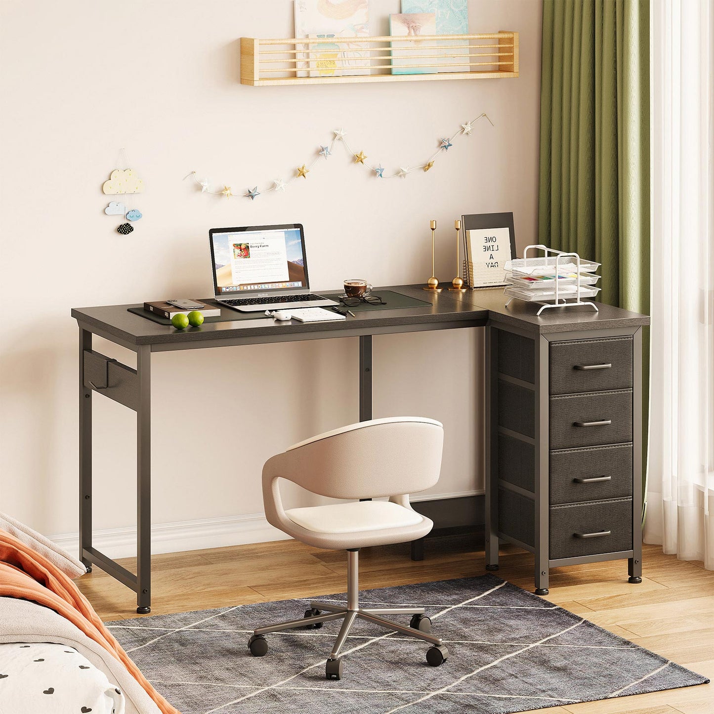 Black 120cm x 70cm L-shaped desk with 4 fabric drawers in a bedroom office setup, featuring an extended worktop, right-side storage drawers, and space-saving L-shaped design.