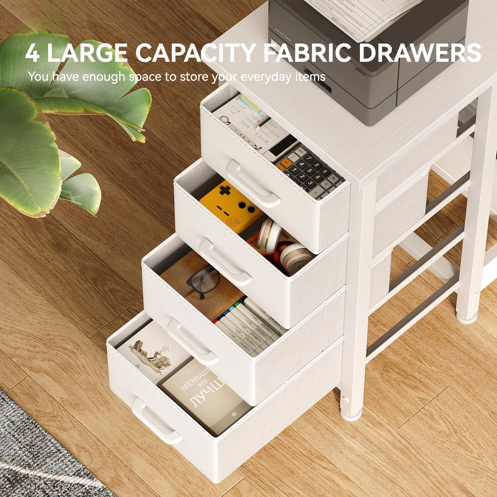 Close-up of 4 large-capacity fabric drawers on a white desk, showing organized storage for office supplies, books, calculator, headphones, and daily accessories.