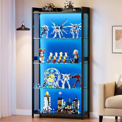 A tall black metal shelving display cabinet with four illuminated blue glass shelves, shown in a living room setting next to a beige armchair and a hanging pendant light. The shelves are filled with various toy models, action figures, and building block sets.