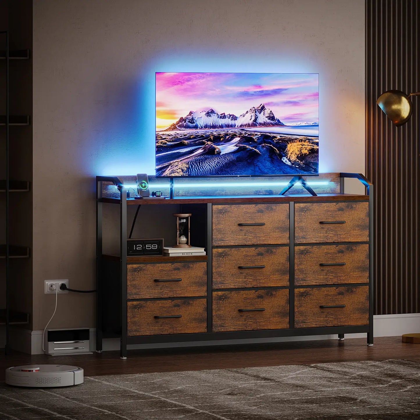 A modern TV stand console with a rustic brown wood finish and black metal frame, featuring six drawers, a shelf with decorative items, and a top surface supporting a television. The console is styled in a living room setting with ambient blue LED lighting under the TV and a wall lamp nearby.
