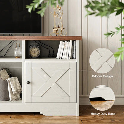 A white TV stand or media console with a wood top, shown in a styled room setting. The cabinet features an X-shaped door design and open shelving on the left.